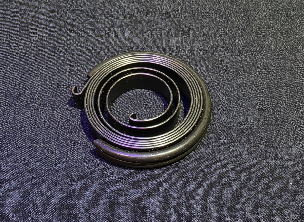 Flash starter big spring — heavy-gauge coiled recoil spring for HE Paramotors flash starter assembly