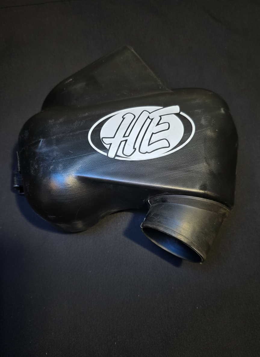 HE-branded black molded air box intake with hose clamp for MVL 125, MV1 and MV2 engines