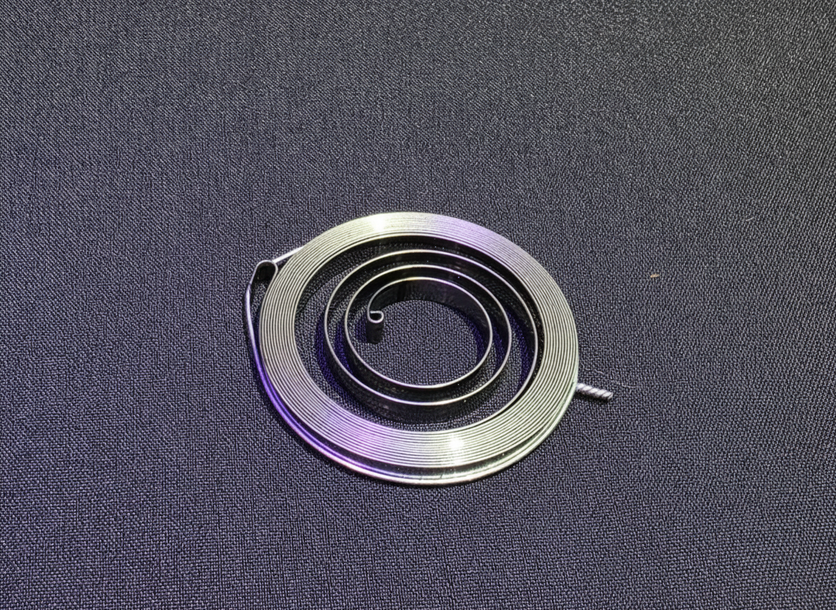 Flash starter recoil spring — flat-wound rewind spring for HE Paramotors flash starter pull-cord assembly